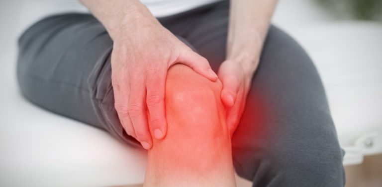 A close-up composite illustration of a person's leg with a glowing red highlight indicating severe bone-on-bone knee pain in the joint.