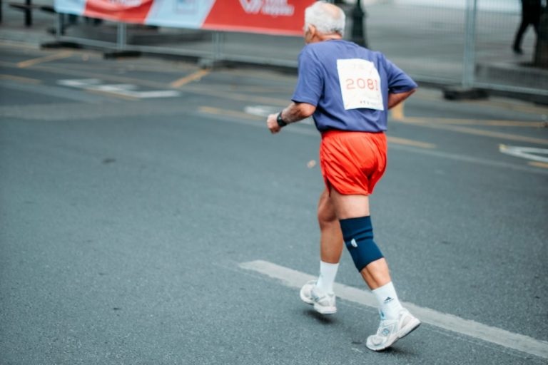 Active older adult outdoors representing knee arthritis mobility and driving independence