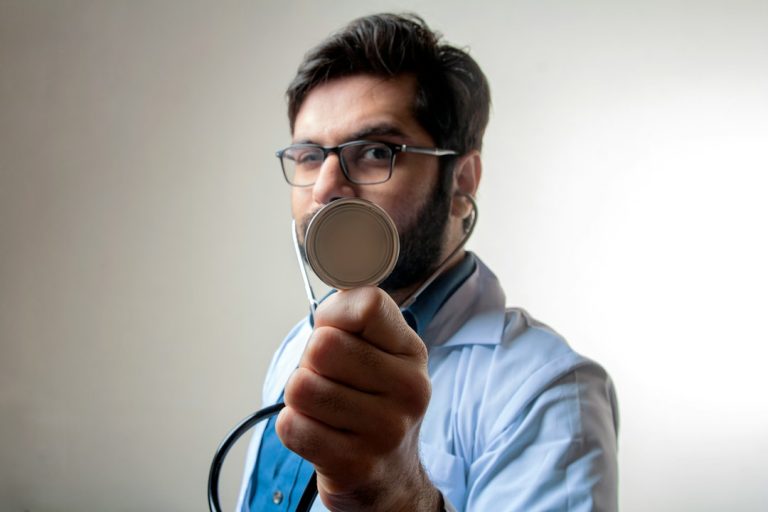 Doctor in healthcare setting representing knee pain treatment consultation